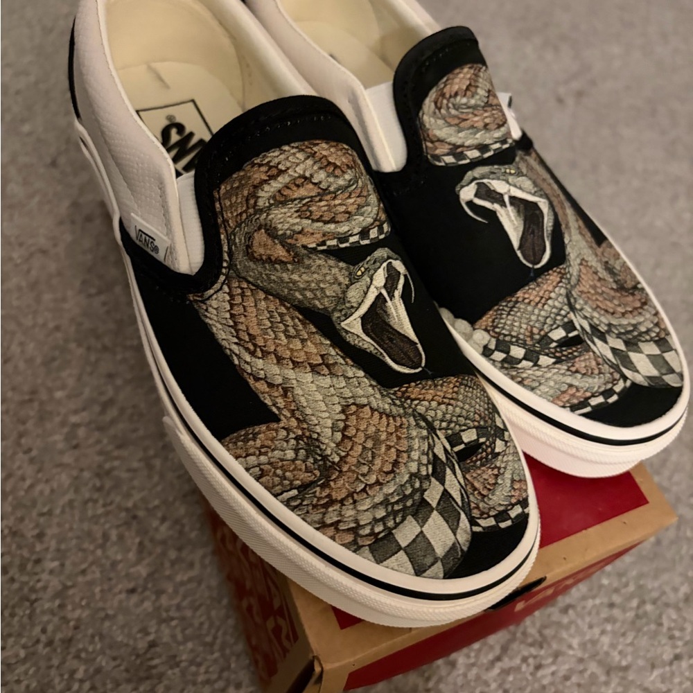 Vans Black and White Snake Graphic Slip-Ons